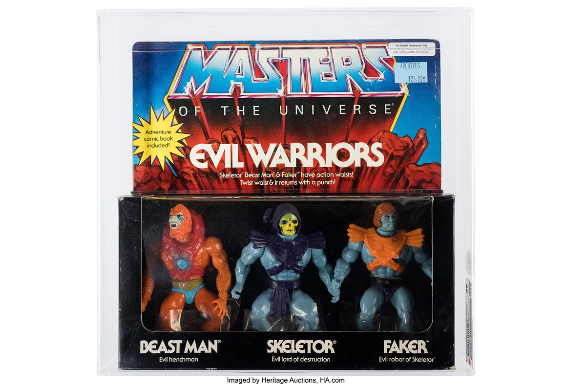 Masters of The Universe Mattel Archives Evil Warriors 3-pack CAS 75 (Mattel, 1982) The Evil Warriors 3-pack was released by Mattel in 1982 and had several figure variations. This set includes Skeletor, Beast Man, and Faker. Measuring 12.5 inches by 13 inches, by 3 inches, the piece is sealed and graded 75 by CAS with sub grades of B75 W80 F90 (Real Grade Y 77.1) The grading sticker also designates that this is from "Mattel Archives / Employee Promo". A separate Statement of Archival document from CAS is included.

This piece was purchased from Mattel by a former employee when they liquidated their archives. The blue sticker on front has a price and is marked "Archives". An additional sticker on the front of the box reads: "For Mattel Employees Only. Not For Resale. Historic Archives product. May not be suitable for child play."