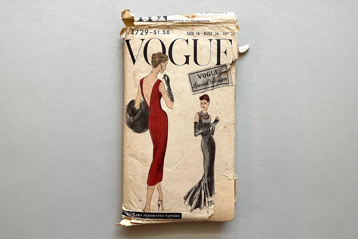 Sleek vintage 1950s Vogue Special Design sheath dress pattern, S-4729, 1956, size 16/36" bust, deep V back, opt. flared flounce, complete