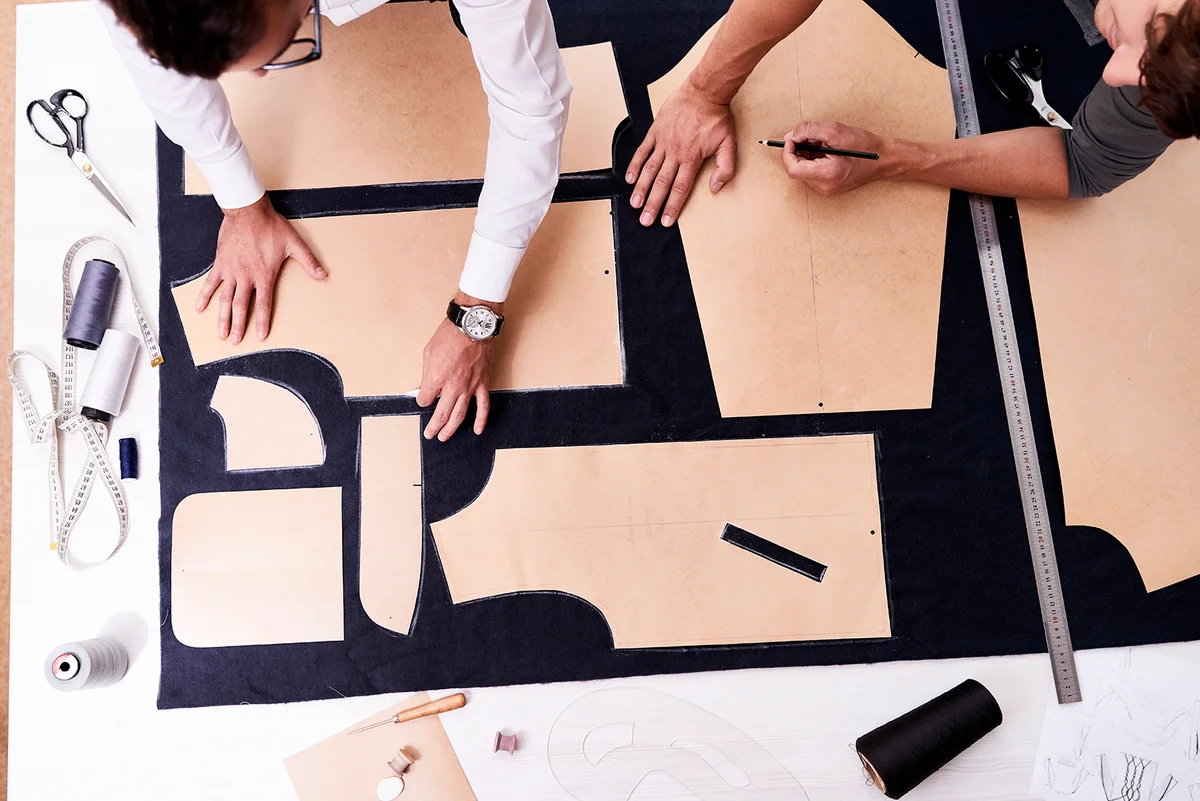 tailors using sewing patterns