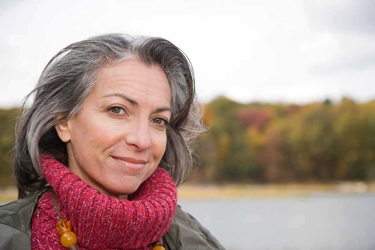woman wearing a red scarf