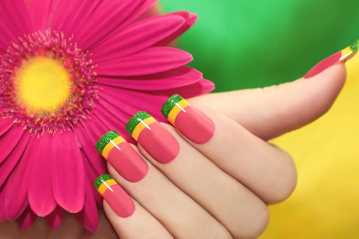 Multicolored manicure with pink,yellow and green lacquer