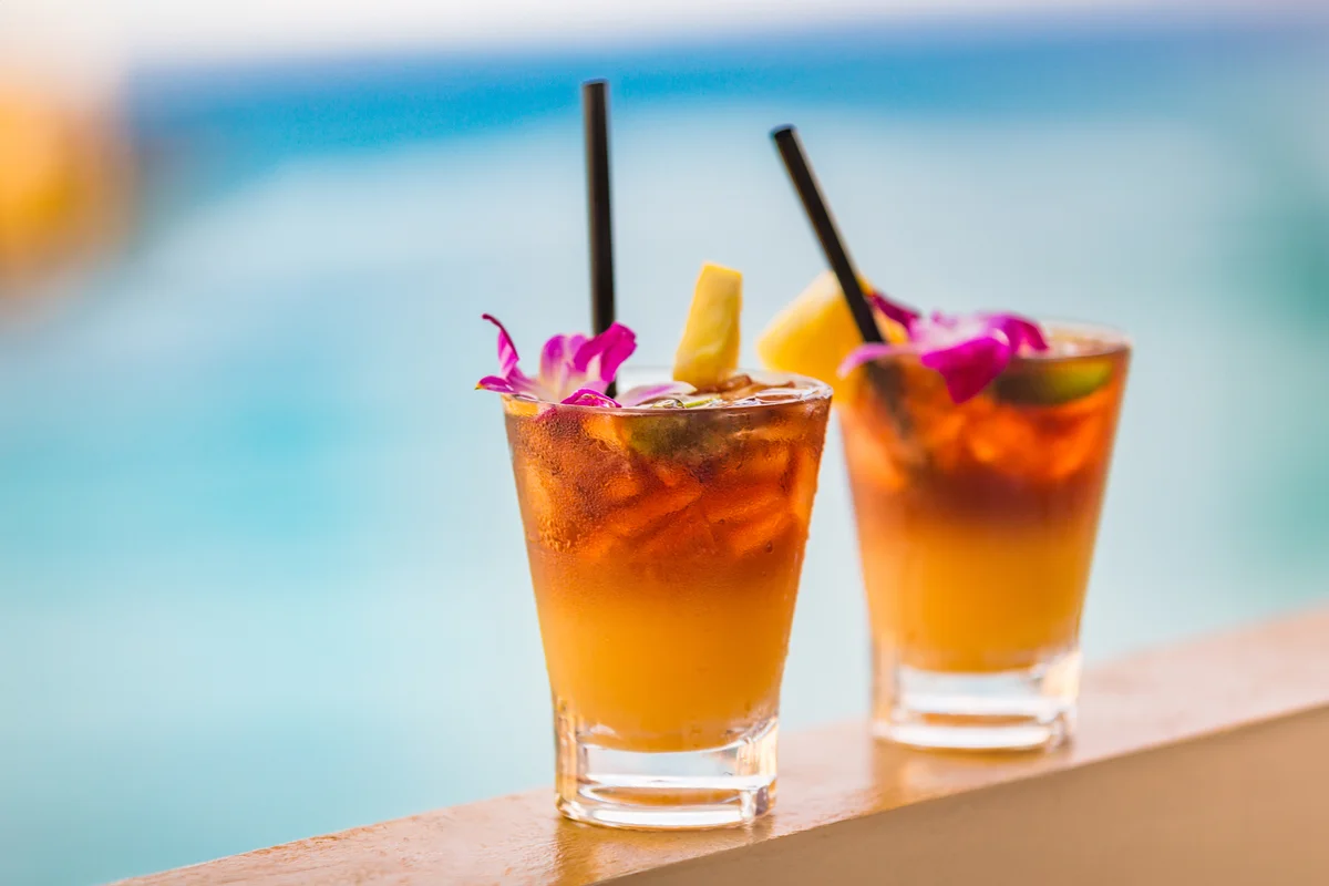 Hawaii mai tai drinks on waikiki beach swimming pool bar travel vacation