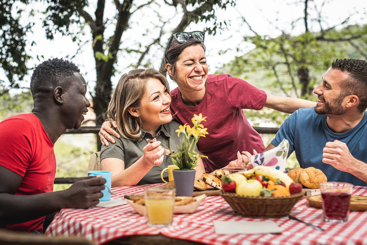 people having breakfast in the garden