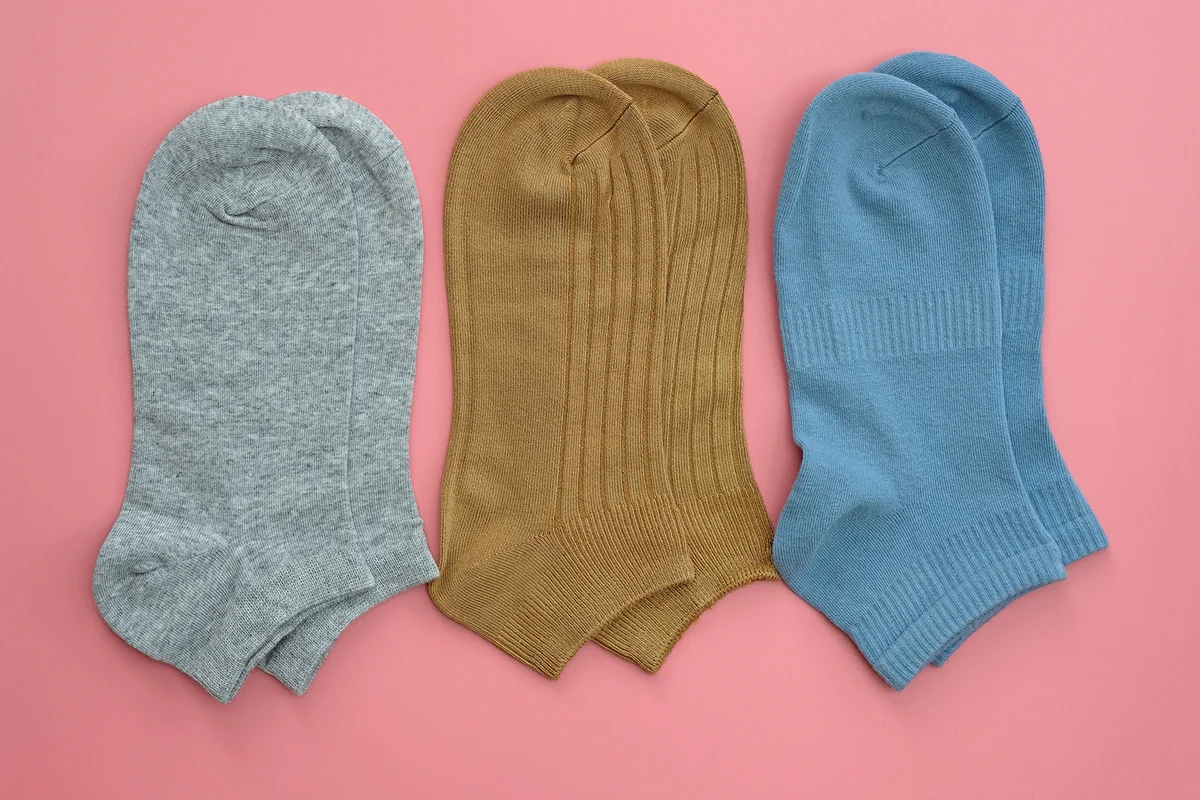 short socks of gray, brown and blue top view.