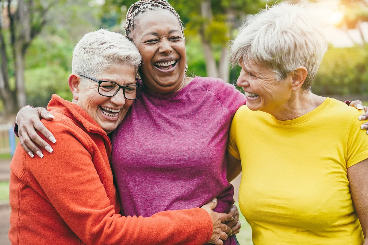 Multiracial senior women having fun together after sport workout outdoor