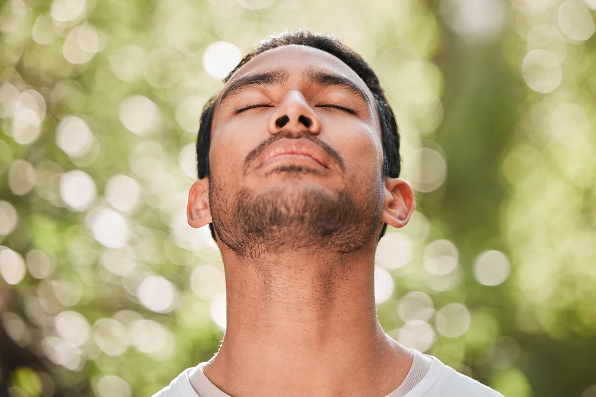 Man, breathing and relax with peace in nature