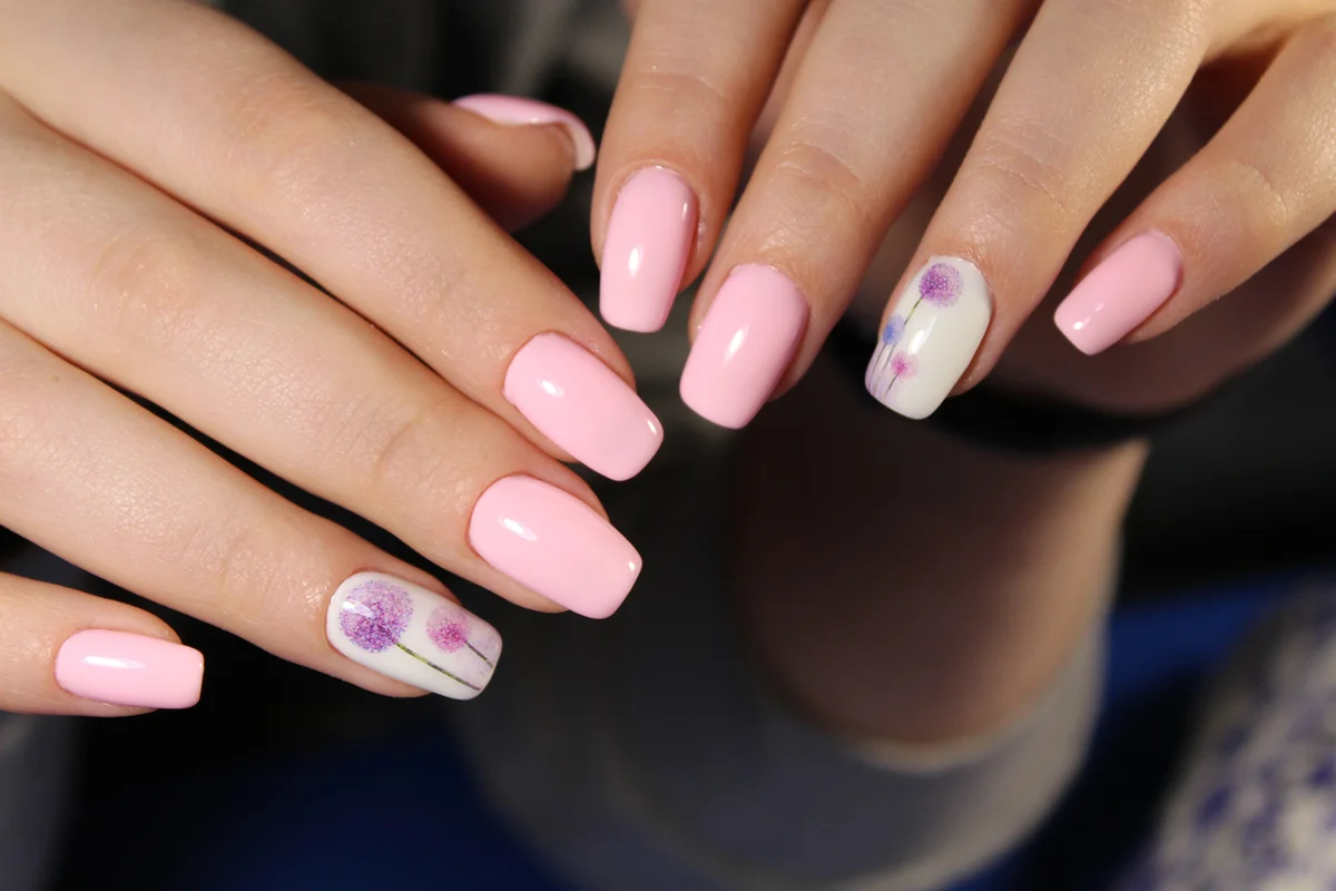 glamorous pink manicure on long beautiful nails