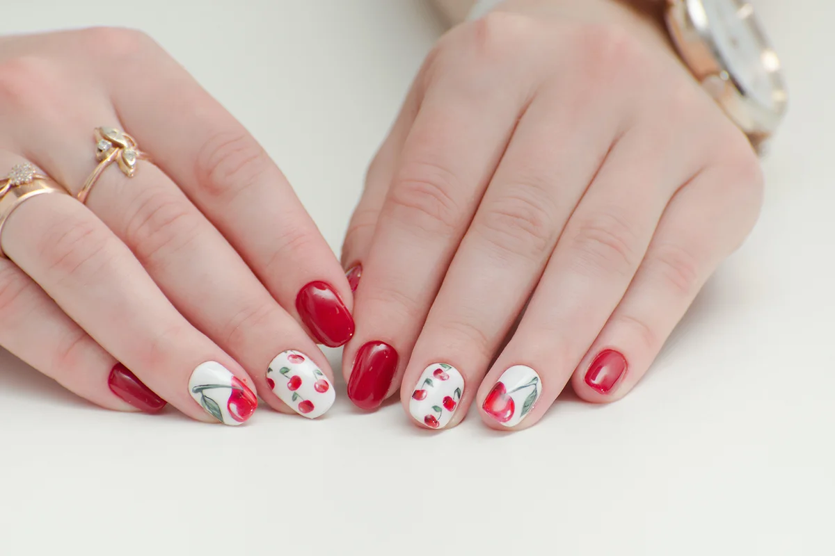 red nail polish, drawing with cherries