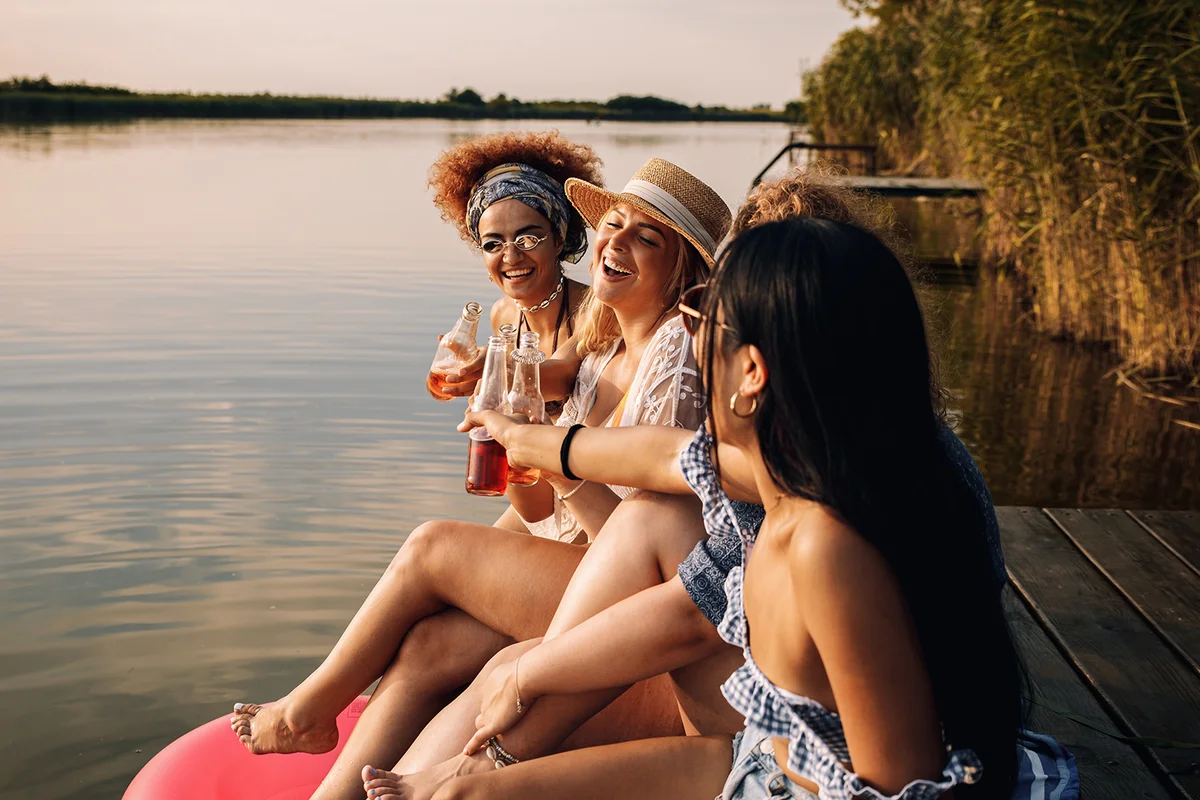 female friends enjoying a summer day at the lake