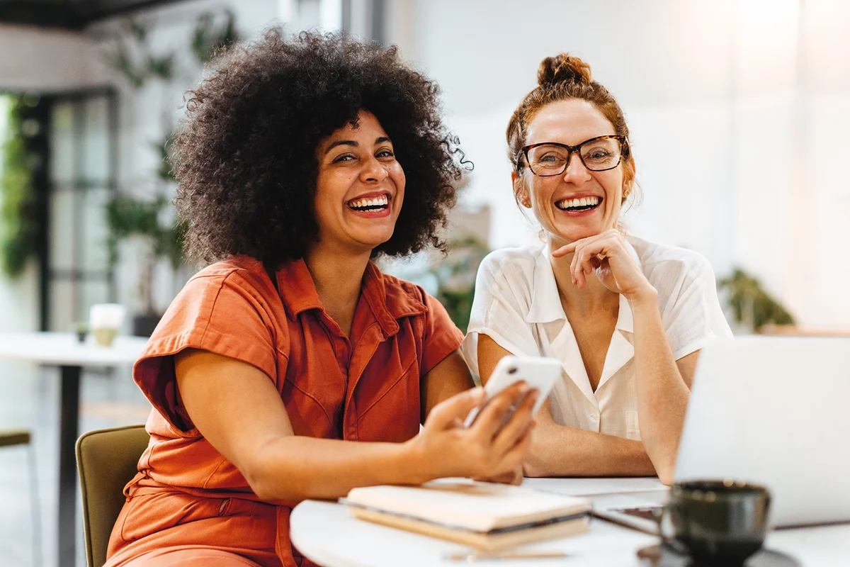 Two successful businesswomen working together on a project