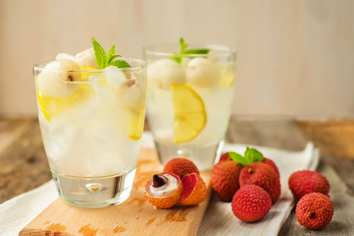 Lychee juicy cocktai,l fizzy drink with mint in glass.