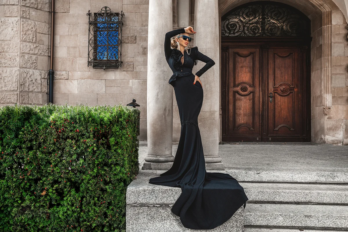 woman in elegant long dress on palace background