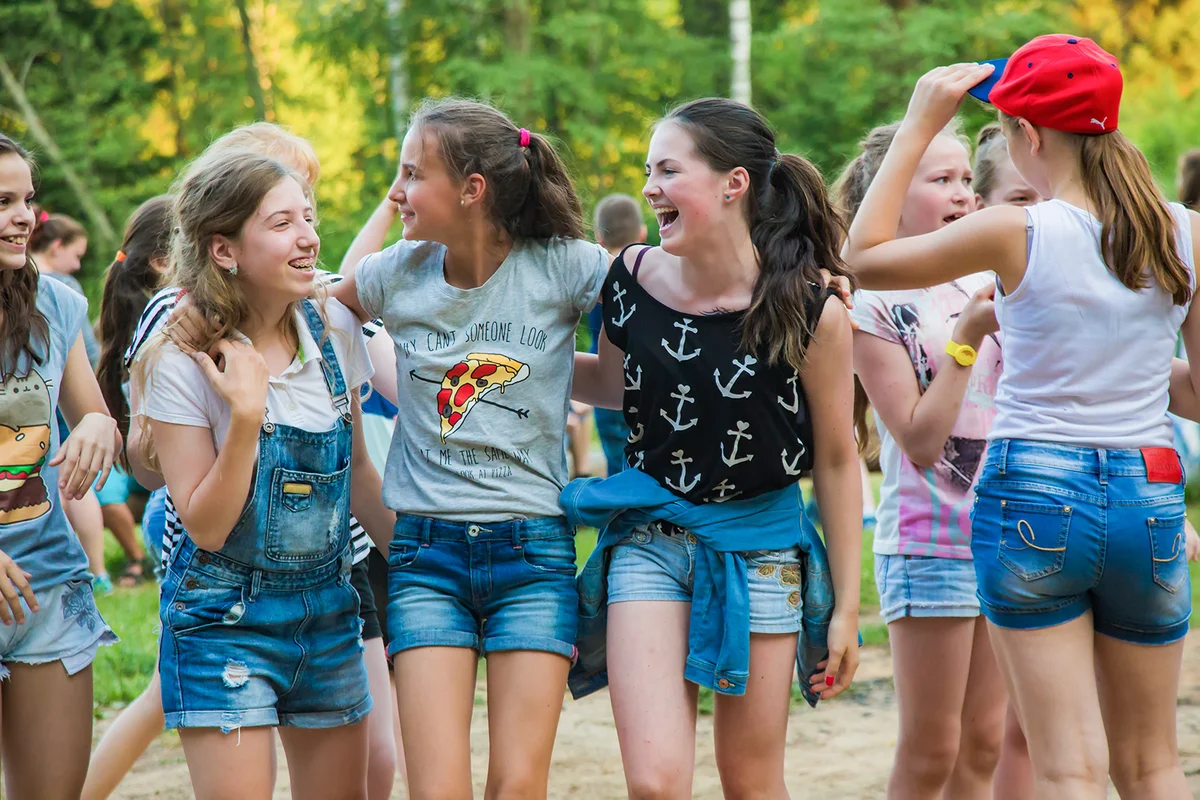 A group of girls Teens walking in summer camp