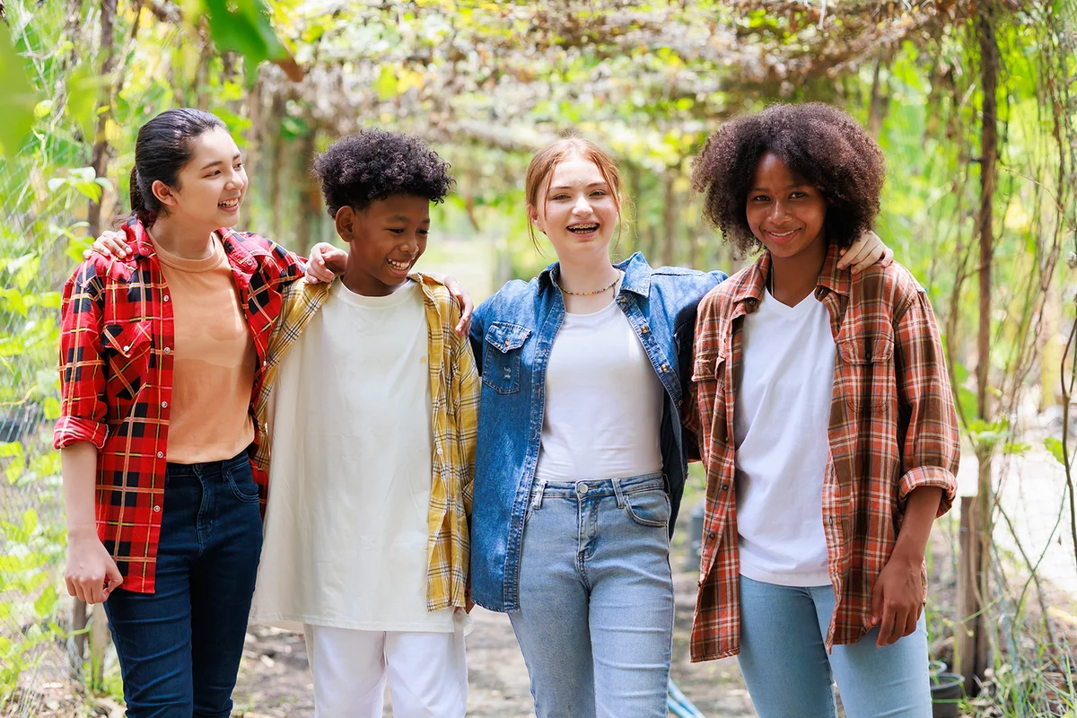 Group portrait diverse teenage boy and girls