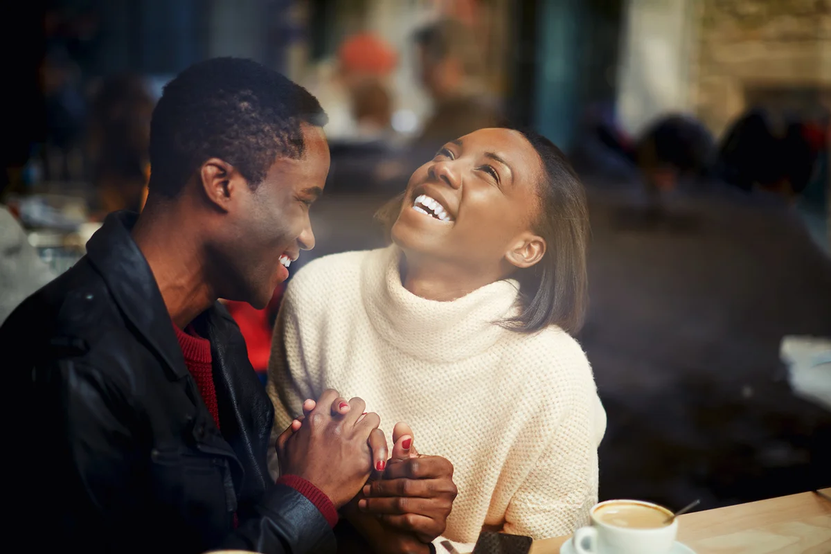 Two people in cafe enjoying the time spending with each other,