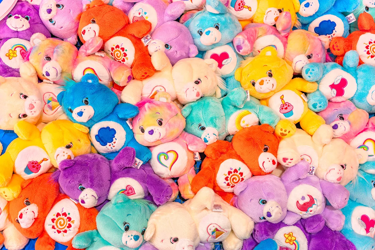 Bunch of plushies of multi-colored Care Bears