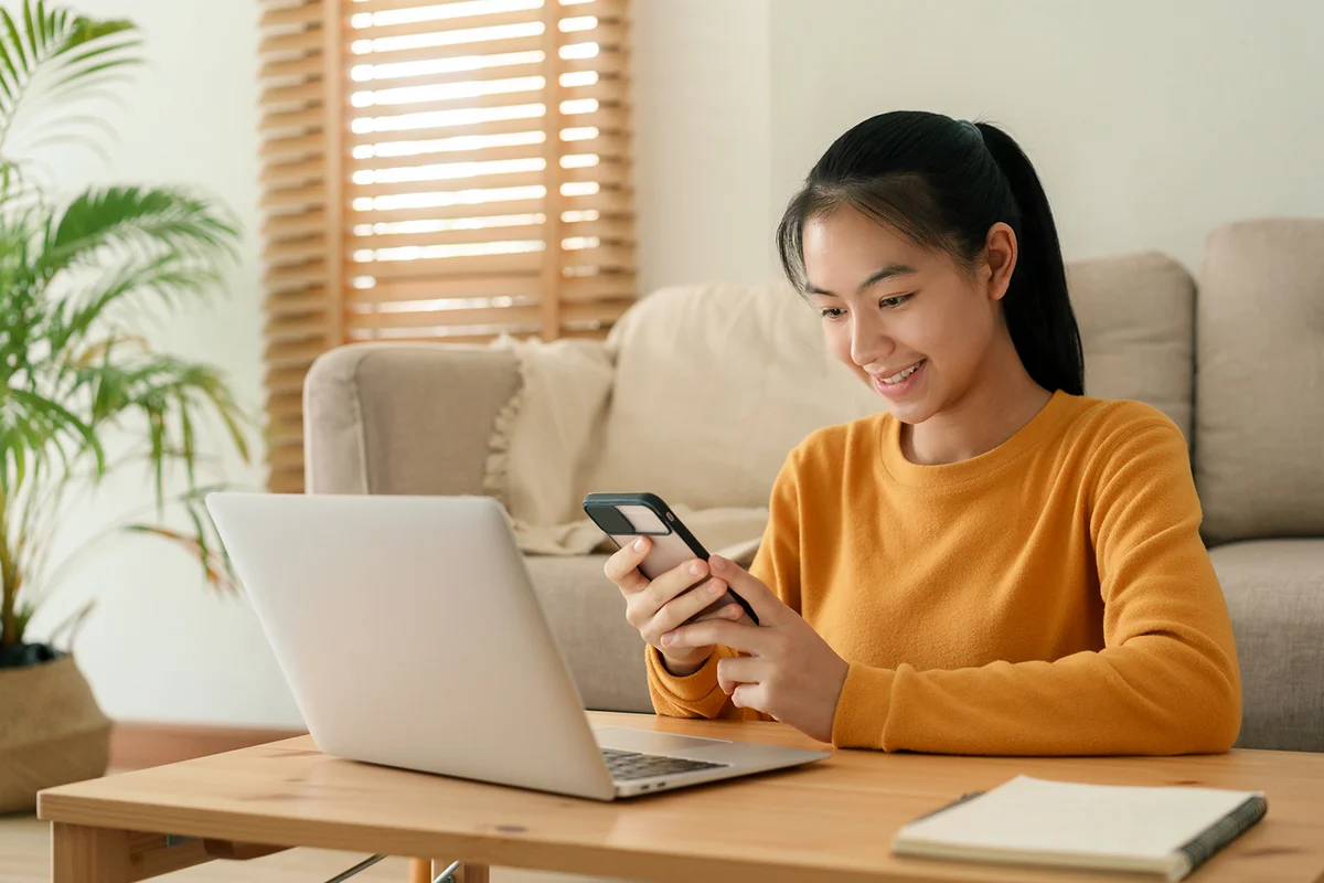 Teen girl texting on her cell phone