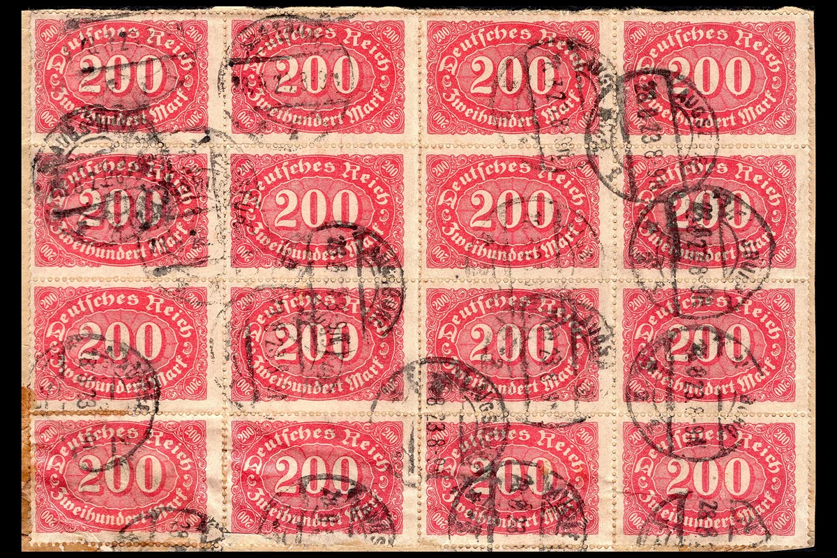 A German Empire (Reich) postage stamp shows famaus people on the cover fragman. Circa 1940