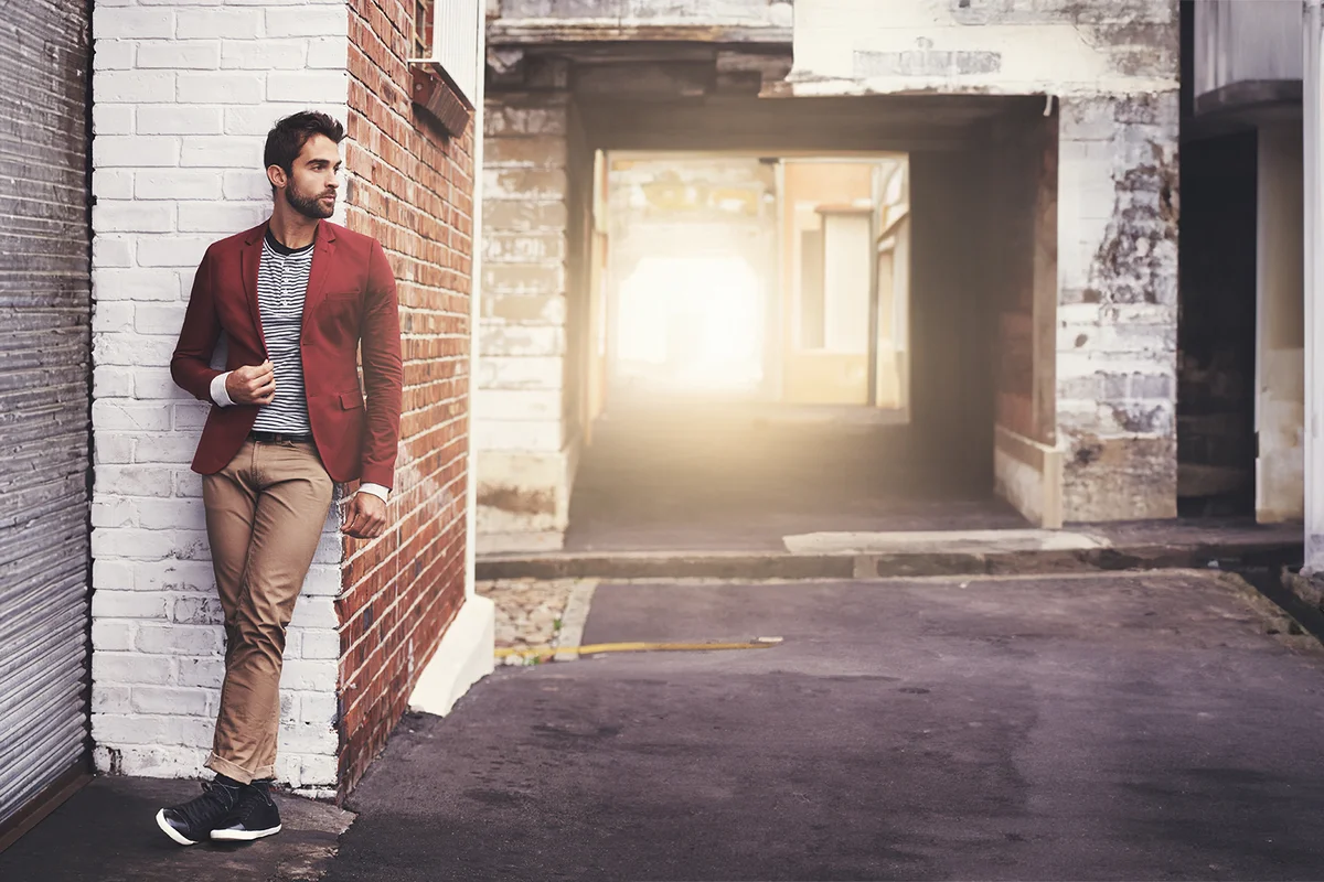 Man, fashion and confident model in city with trendy style or winter accessories outdoor. Urban, unique and stylish with designer clothes, edgy and chic with