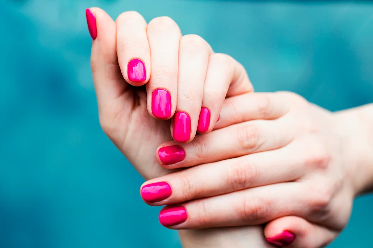 Nails Design. Hands With Pink Summer Manicure On Grey Background. Close Up Of Female Hands. Art Nail.