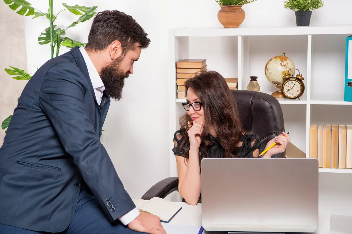 couple flirting at the office