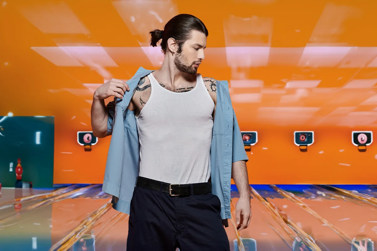 Handsome caucasian man in trendy attire posing confidently.