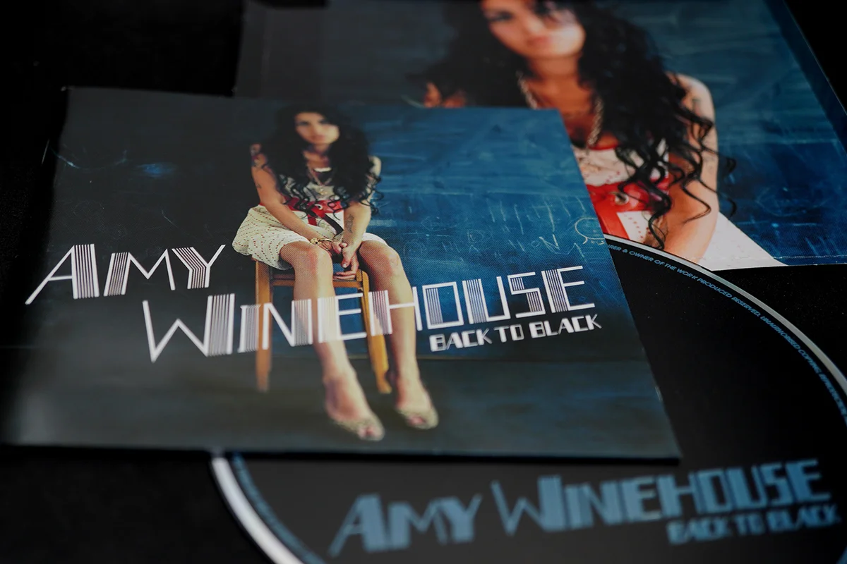 CD covers and inserts by singer-songwriter, stylist, record producer and British guitarist AMY WINEHOUSE
