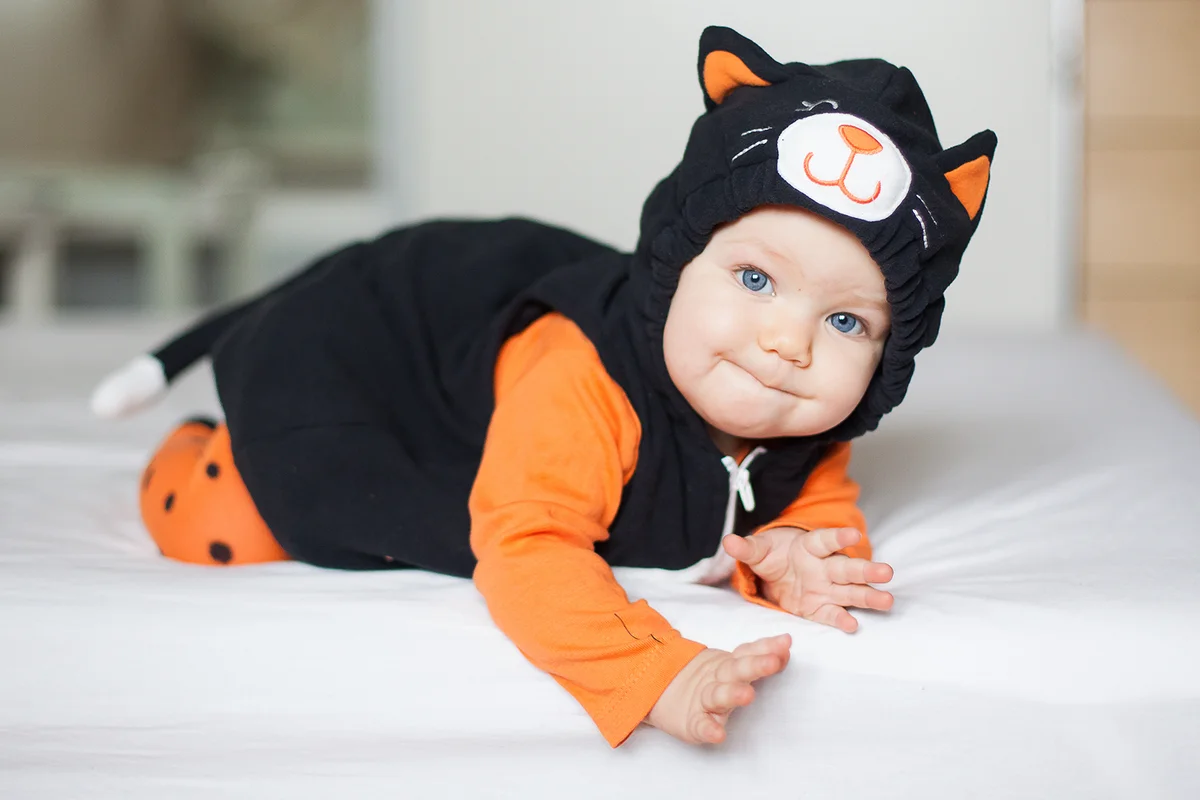 Baby girl in cat costume