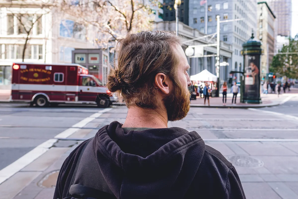 Profile of a man looking to his right in downtown San Francisco.