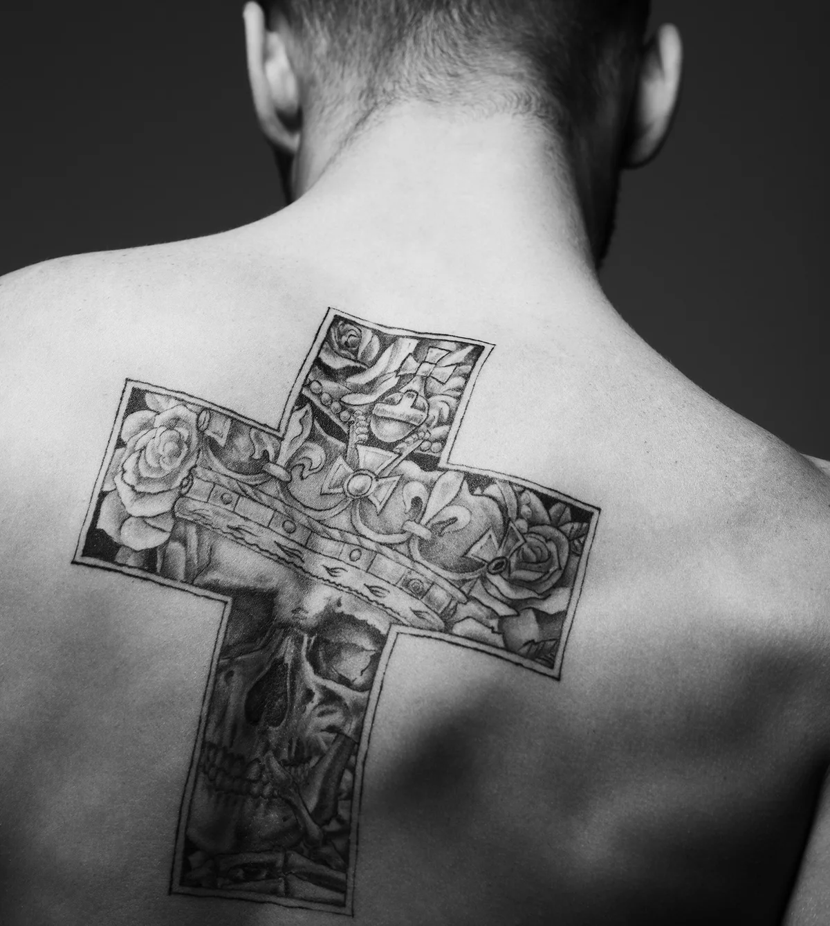 man's back posing over dark background