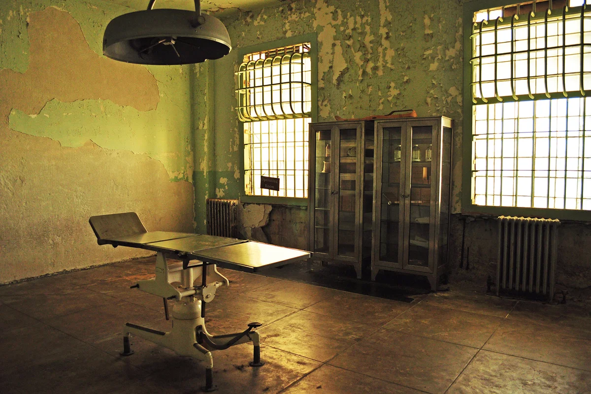 Alcatraz Island, 06/13/2010: stretcher in the infirmary in the Main Cell House of Alcatraz Federal Penitentiary,