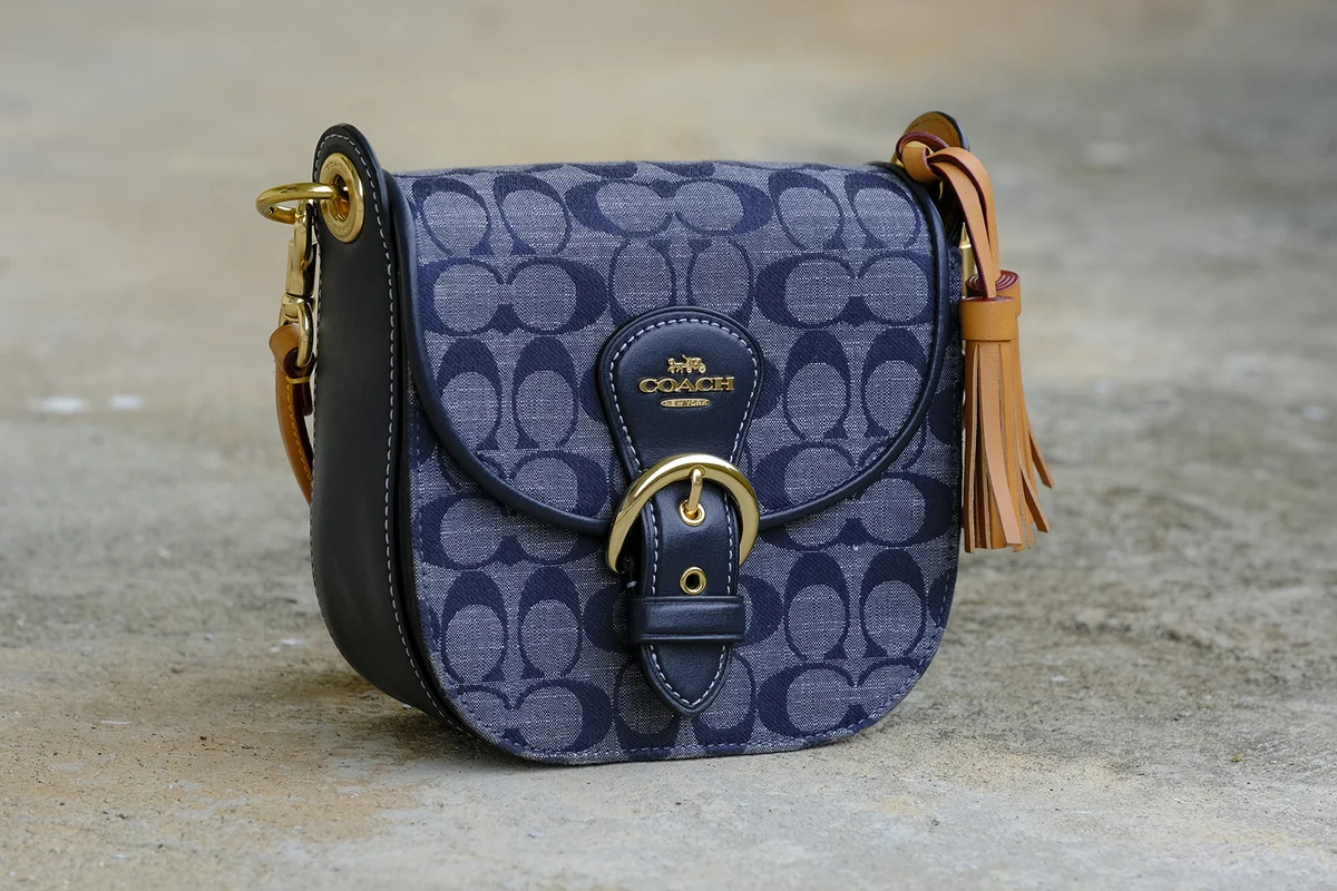 Duri, Indonesia, December 22, 2022. Hand bag for woman. Coach Kleo shoulder bag in signature chambray.