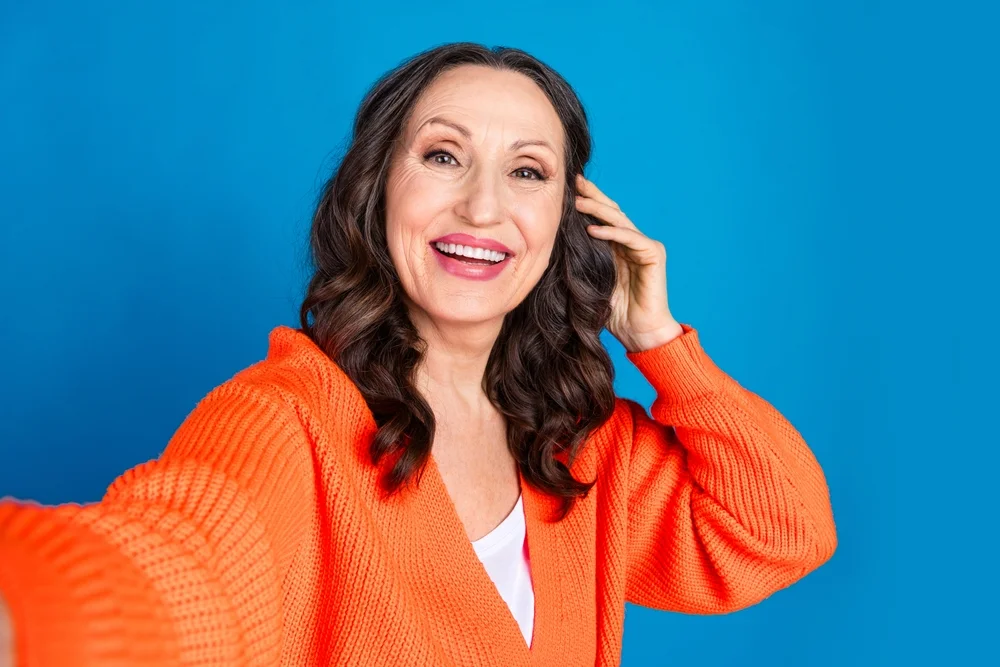 older woman with brown hair