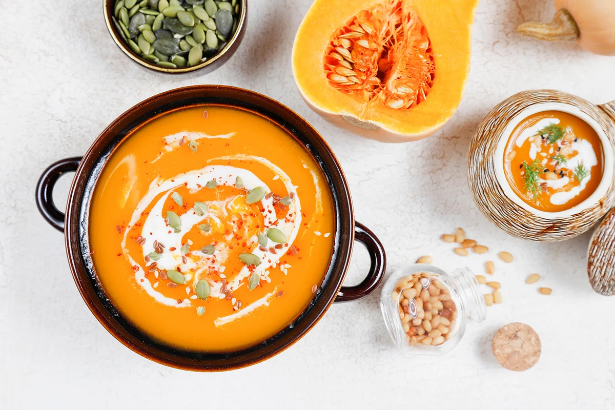 Traditional autumn butternut squash soup with seeds