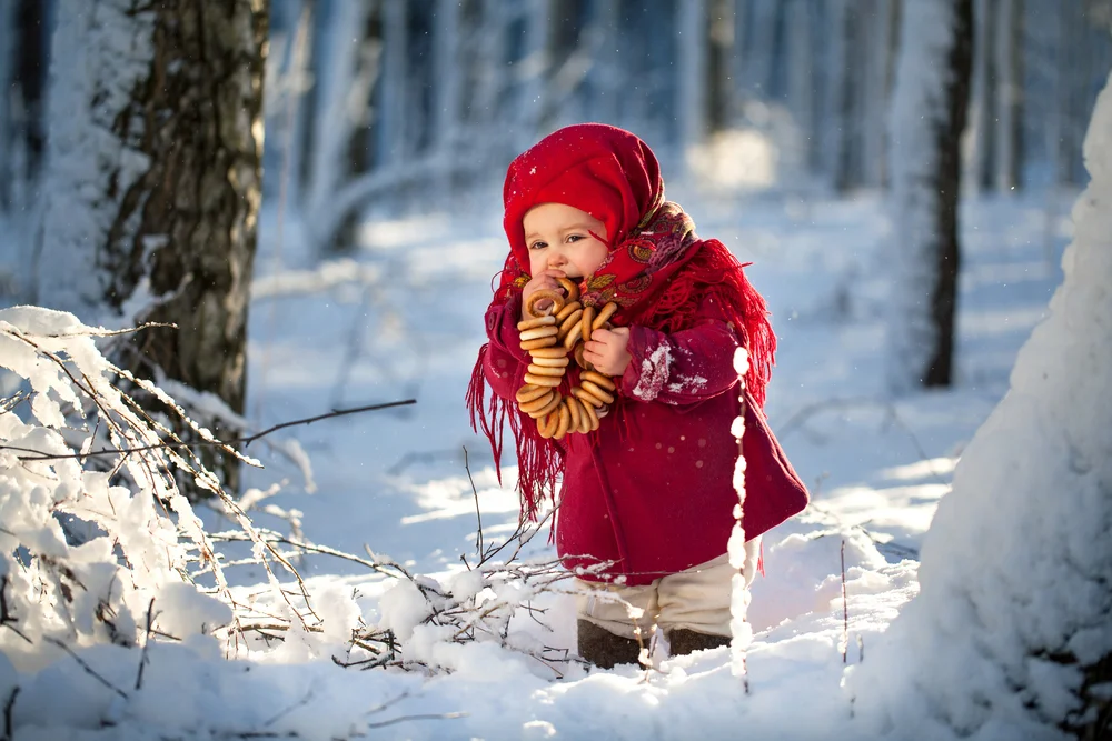 toddler in a red coat