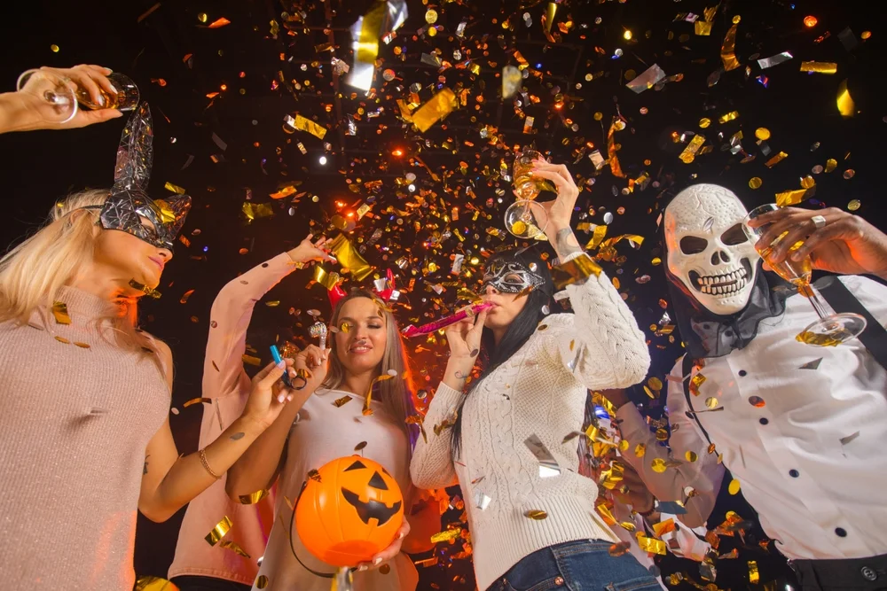 adults at a Halloween party