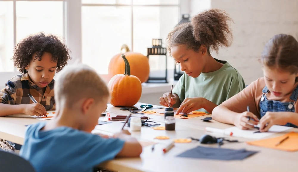 kids doing Halloween crafts