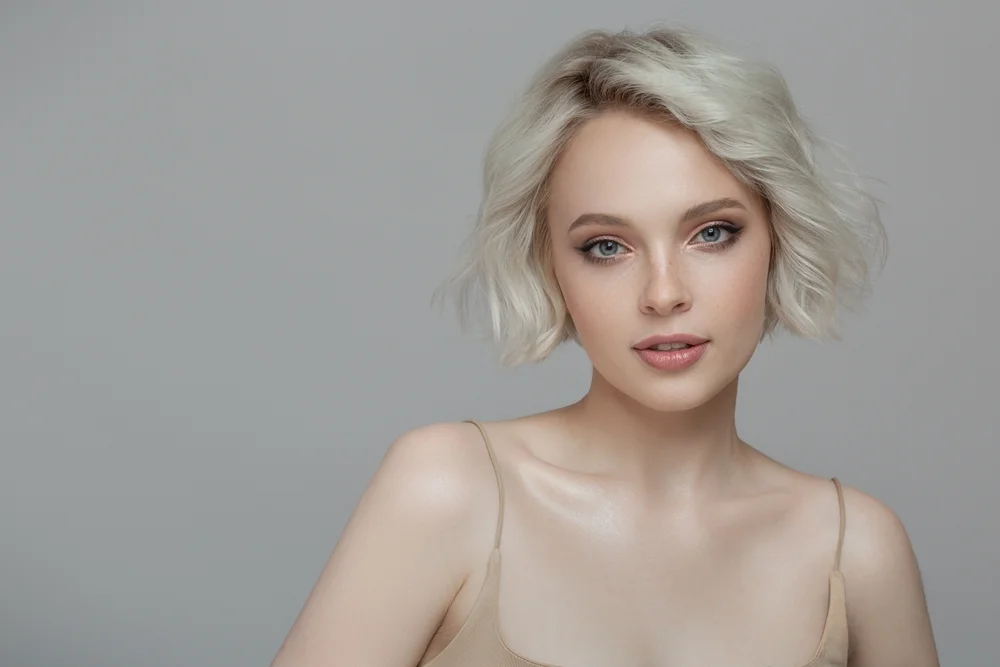 woman with peaches & cream makeup