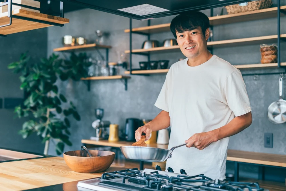 man cooking in the kitchen