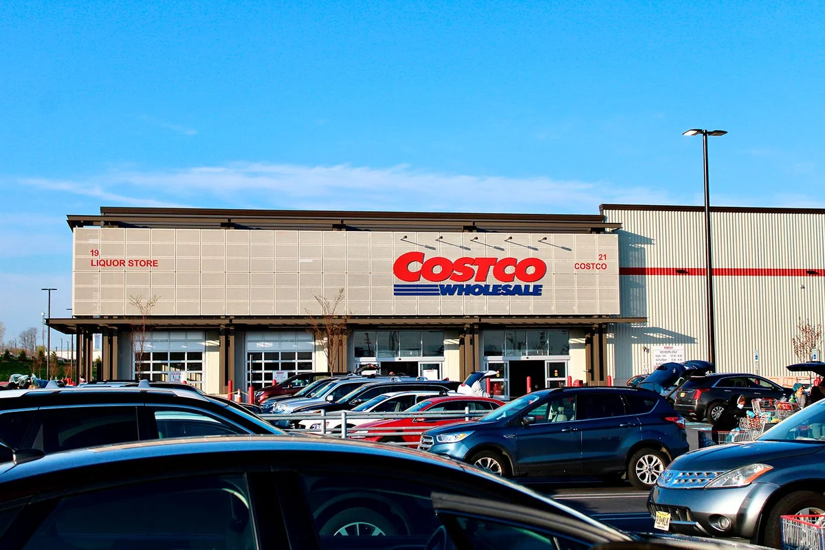 Jersey City, New Jersey - April 7 2020: A lot of people have come for shopping and parked their cars outside a Costco Wholesale supermarket during the Corona(COVID) virus outbreak(Pandemic).