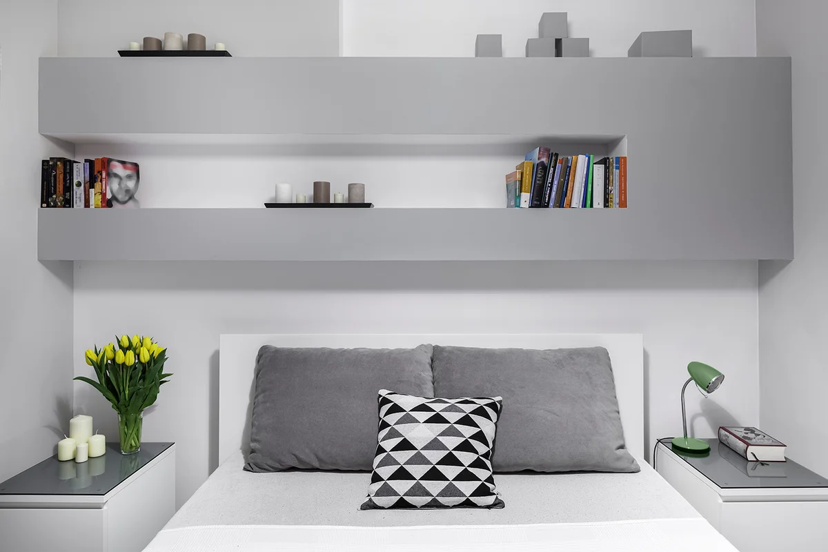 Modern bedroom interior with Bookshelf Headboard