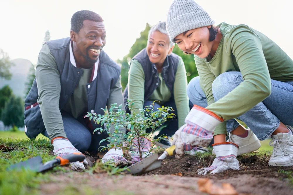 A Scorpio man helping at community service, volunteering in the park.