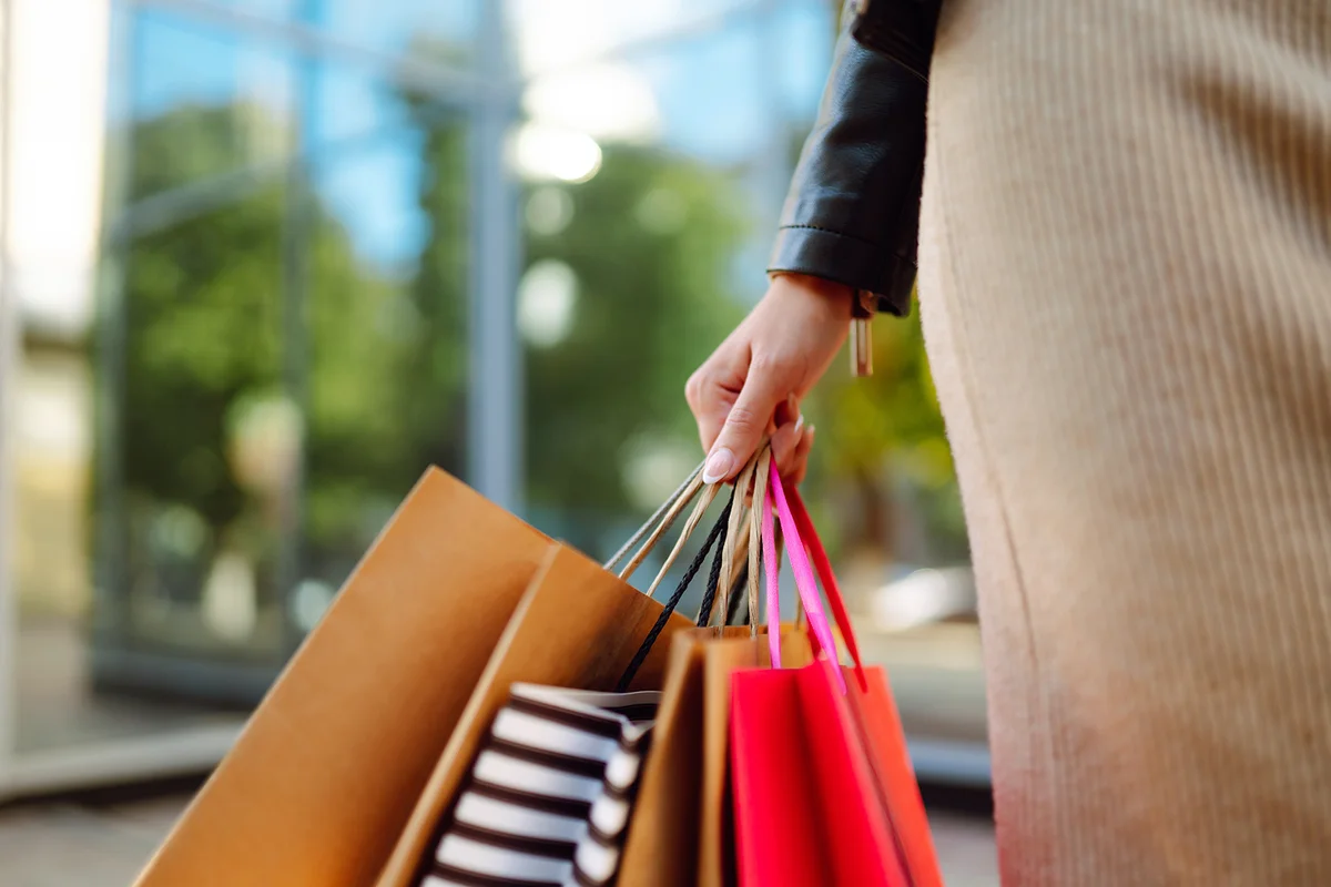 Shopping bags in the woman hands