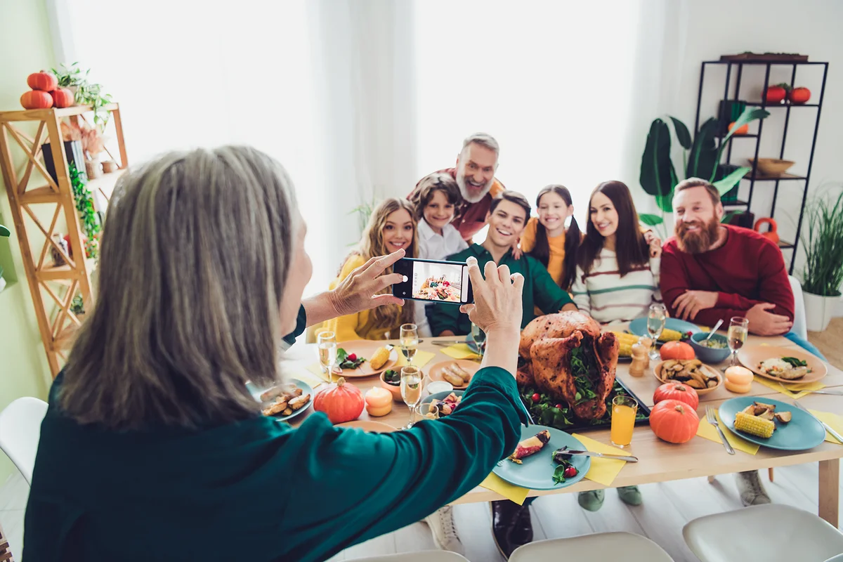 charming happy big family celebrating thanksgiving day