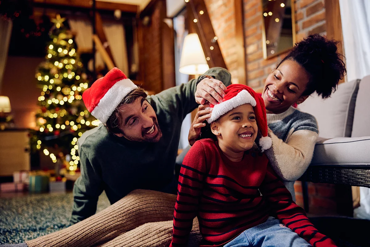family having fun while spending Christmas eve together
