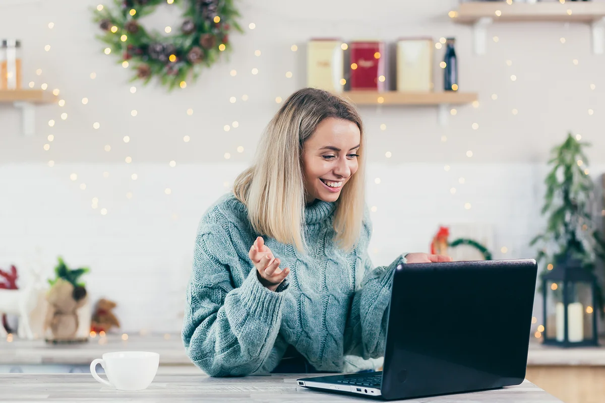 woman video call at home on laptop during Christmas