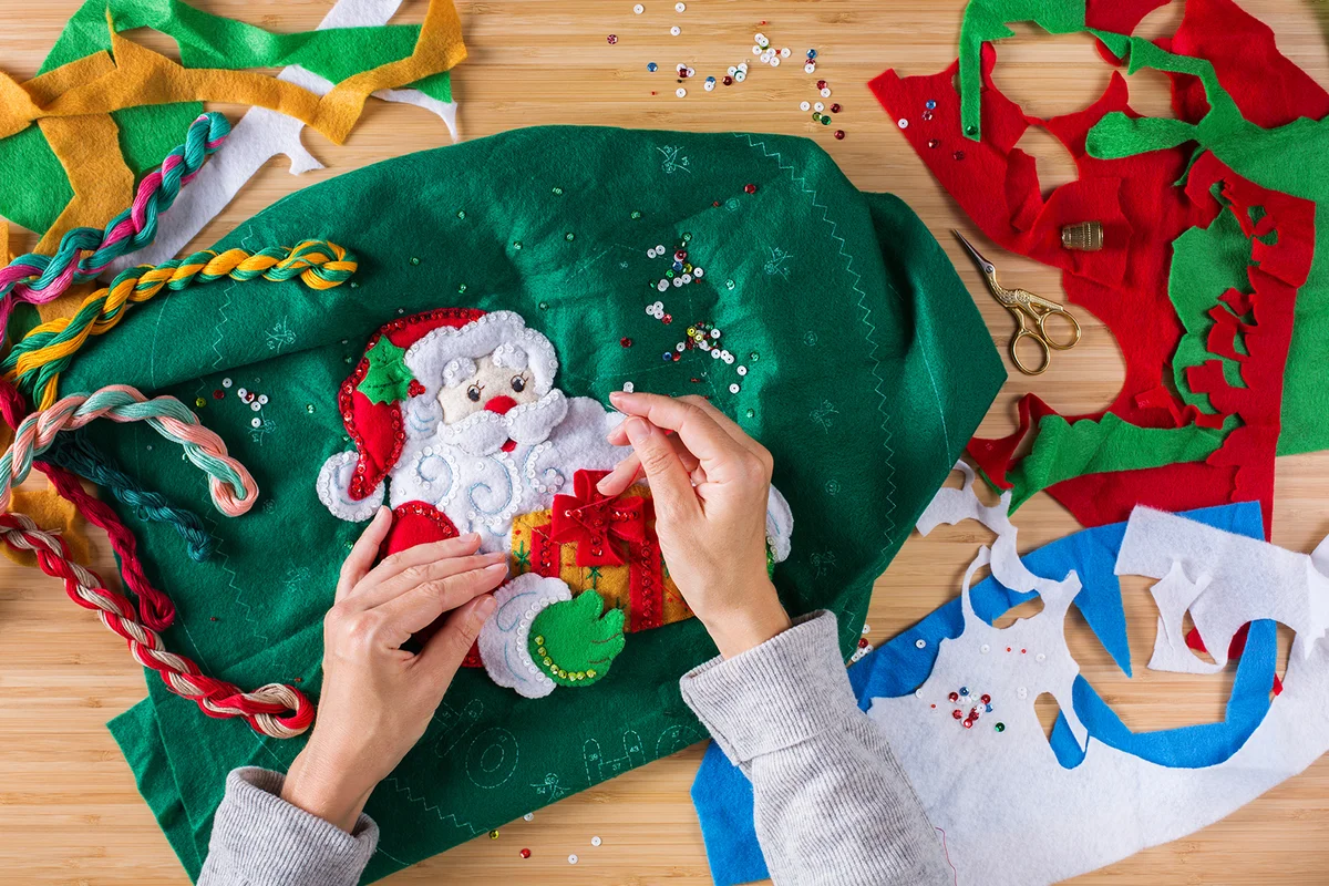 Woman hands making Christmas decor