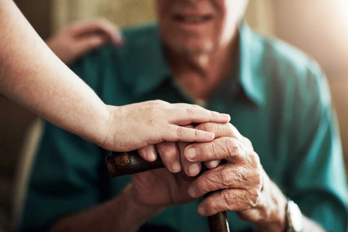 elderly man and woman in nursing home with support for retirement