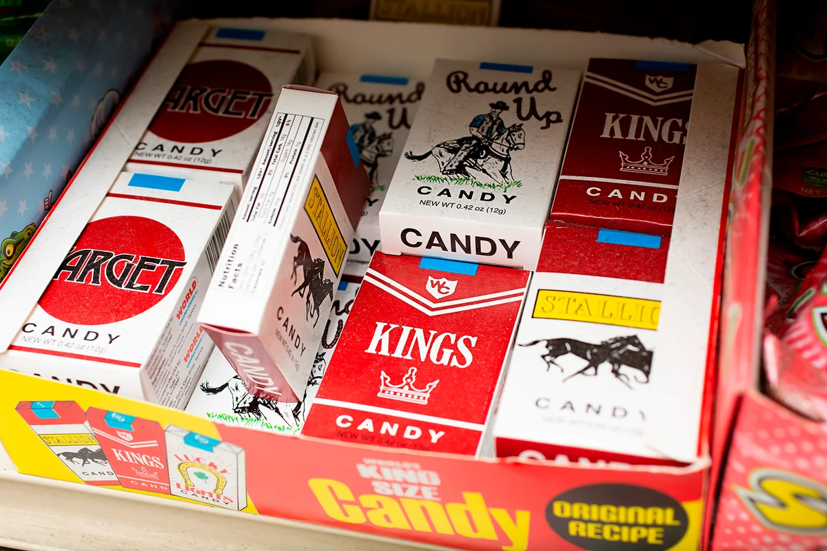 Los Angeles, California, United States - 07-22-2020: A view of a case of candy cigarettes, featuring brands as Kings, Stallion, Round Up, and Target, seen at a local grocery store.