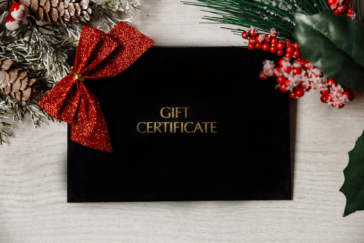 Festive Christmas and new year black gift certificate